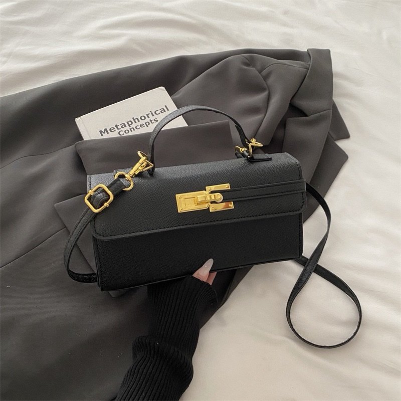 Regal Mini Lock Crossbody Bag
